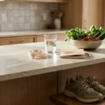 Kitchen counter with a measuring tape, vegetables and walking shoes for cortisol belly questions